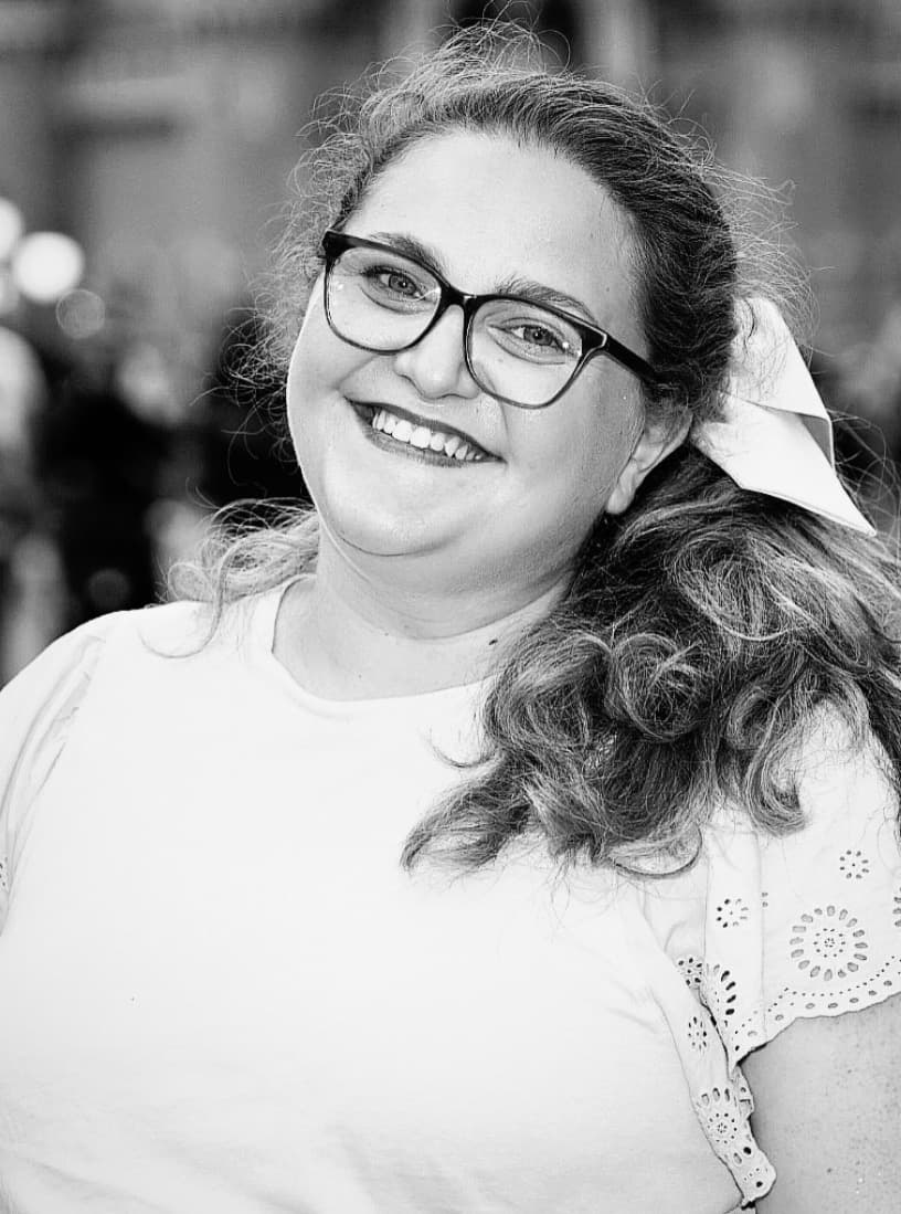 Black and white headshot photo of Michelle.